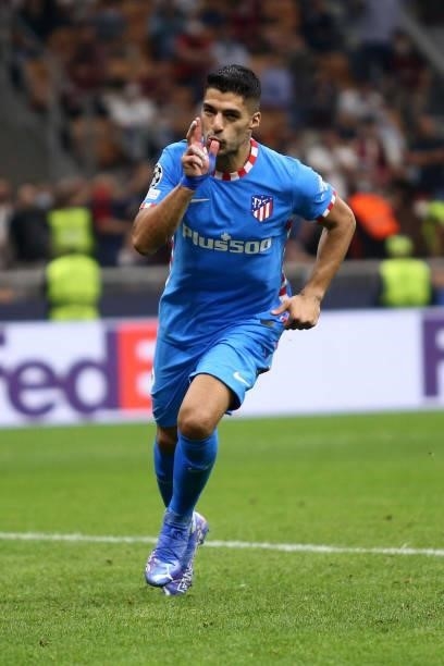 Luis Suarez of Atletico Madrid celebrates after scoring his team's second goal prior to the UEFA Champions League Group B match between AC Milan and...
