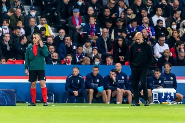 Head coach Josep Guardiola of Manchester City looks dejected during the UEFA Champions League match between Paris Saint Germain and Manchester City...