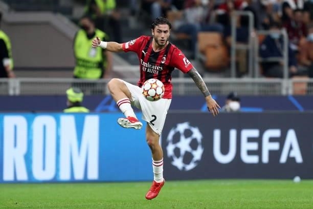 Davide Calabria of AC Milan controls the ball during the UEFA Champions League Group B match between AC Milan and Atletico Madrid at Giuseppe Meazza...