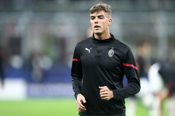 Daniel Maldini of AC Milan warms up prior to the UEFA Champions League Group B match between AC Milan and Atletico Madrid at Giuseppe Meazza Stadium...