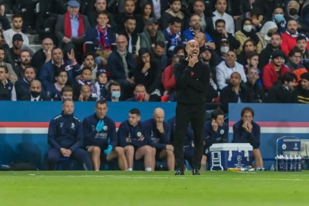 Head coach Josep Guardiola of Manchester City gestures during the UEFA Champions League match between Paris Saint Germain and Manchester City at Parc...
