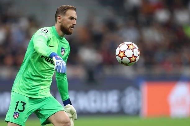 Goalkeeper Jan Oblak of Atletico Madrid controls the ball during the UEFA Champions League Group B match between AC Milan and Atletico Madrid at...