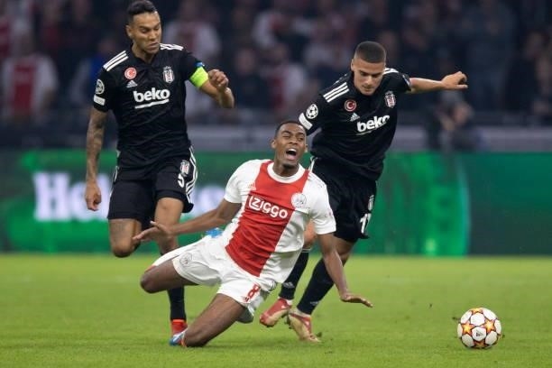 Souza of Besiktas, Ryan Gravenberch of AFC Ajax and Can, Bozdogan of Besiktas Battle for the ball during the UEFA Champions League group C match...