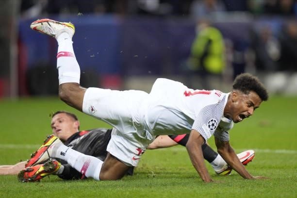 Karim Adeyemi of Salzburg is fouled by Gabriel Gudmundsson of Lille, the following penalty leading to 1:0 during the UEFA Champions League group G...
