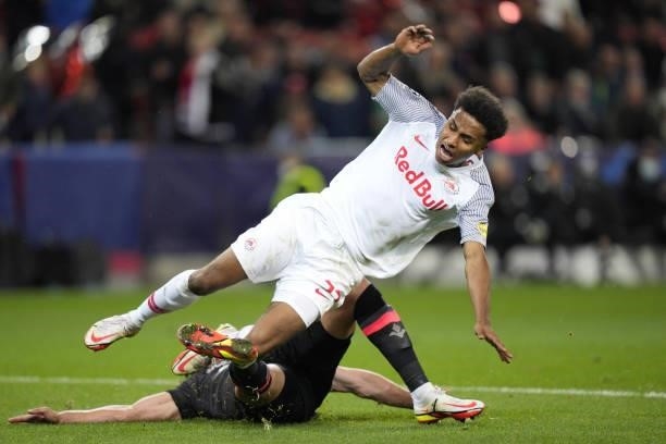 Karim Adeyemi of Salzburg is fouled by Gabriel Gudmundsson of Lille, the following penalty leading to 1:0 during the UEFA Champions League group G...
