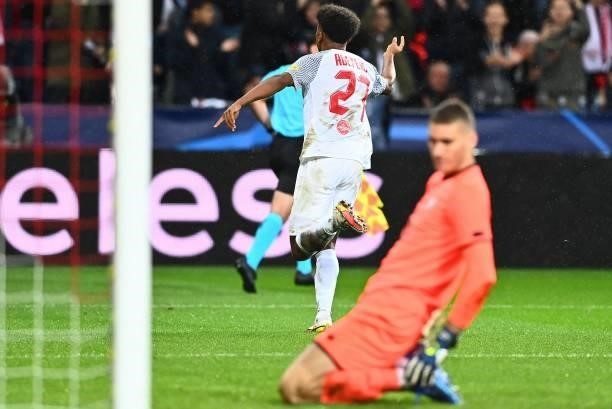 Salzburg's German forward Karim Adeyemi celebrates scoring his second peanalty past Lille's Croatian goalkeeper Ivo Grbic the UEFA Champions League...