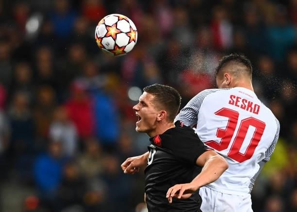 Salzburg's Slovenian forward Benjamin Sesko heads the ball the UEFA Champions League Group G football match between RB Salzburg and Lille LOSC in...