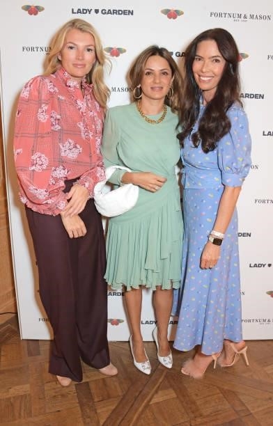 Amy Gardner, Anu Hinduja and Josephine Daniel attend the 7th annual Lady Garden Foundation lunch at Fortnum & Mason on September 28, 2021 in London,...