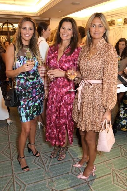 Elle Caring, guest and Magda Palos attend the 7th annual Lady Garden Foundation lunch at Fortnum & Mason on September 28, 2021 in London, England.