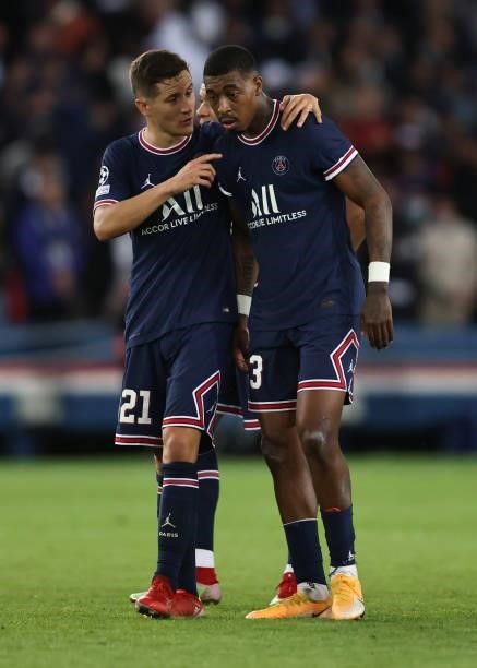 Ander Herrera embraces Presnel Kimpembe of Paris Saint-Germain during the UEFA Champions League group A match between Paris Saint-Germain and...