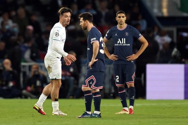 Lionel Messi of Paris Saint-Germain watched by Jack Grealish of Manchester City during the UEFA Champions League group A match between Paris...