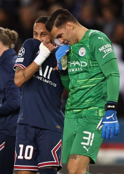 Neymar of Paris Saint-Germain speaks with Ederson of Manchester City during the UEFA Champions League group A match between Paris Saint-Germain and...