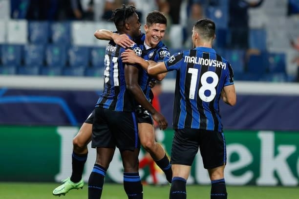 Matteo Pessina celebrates after scoring the opener during the UEFA Champions League football match Atalanta BC vs Young Boys on September 29, 2021 at...