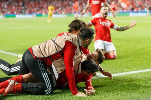 Rafa Silva of SL Benfica celebrates after scoring his team's second goal with teammates during the UEFA Champions League group E match between SL...