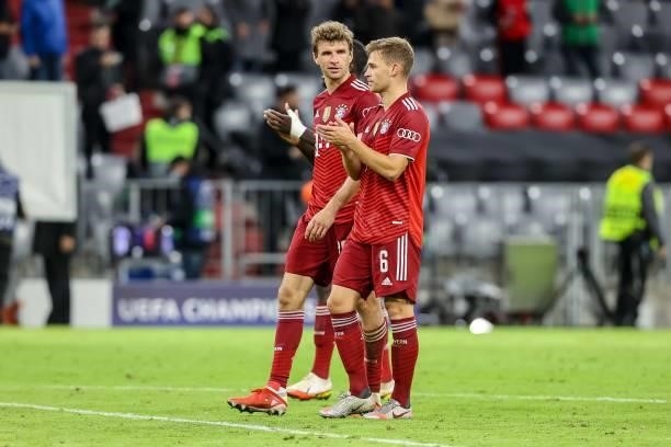 Thomas Mueller of Bayern Muenchen and Joshua Kimmich of Bayern Muenchen look on after the UEFA Champions League group E match between FC Bayern...