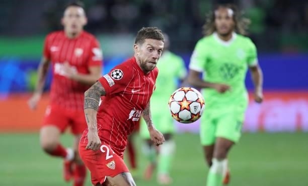 Sevilla's Argentinian midfielder Papu Gomez plays the ball during the UEFA Champions League Group G football match between VfL Wolfsburg and Sevilla...