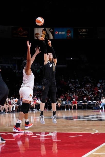 JiSu Park of the Las Vegas Aces shoots a three point basket over Kia Vaughn of the Phoenix Mercury during Game Two of the 2021 WNBA Semifinals on...