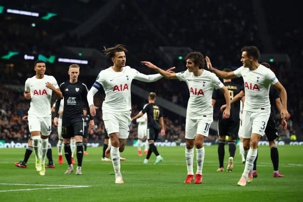 Dele Alli of Tottenham Hotspur celebrates scoring his goal with Bryan Gil and Sergio Reguilon during the UEFA Europa Conference League group G match...