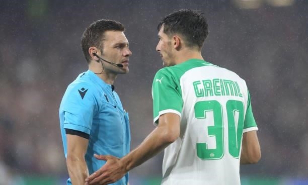 Rapid Vienna's Leo Greiml argues with one of the assistant referees during the UEFA Europa League group H match between West Ham United and Rapid...