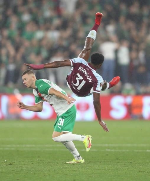 West Ham United's Ben Johnson and Rapid Vienna's Maximilian Ullmann during the UEFA Europa League group H match between West Ham United and Rapid...