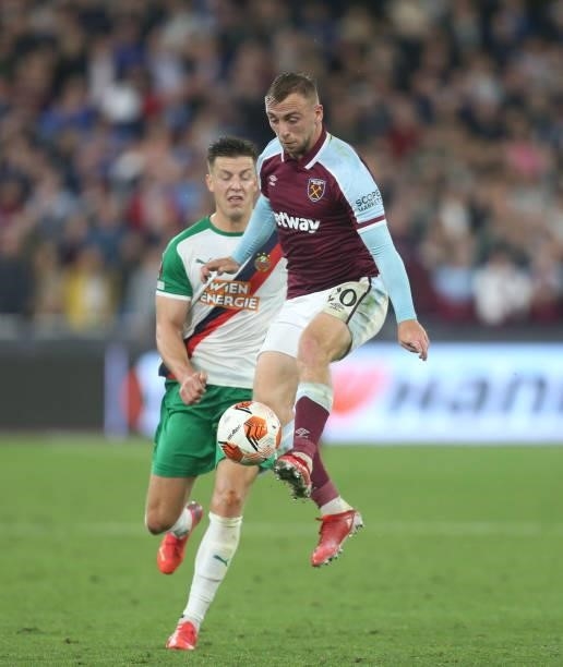 West Ham United's Jarrod Bowen and Rapid Vienna's Kevin Wimmer during the UEFA Europa League group H match between West Ham United and Rapid Wien at...