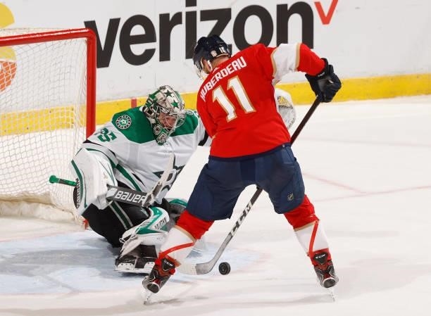 Goaltender Anton Khudobin of the Dallas Stars stops a shot by Jonathan Huberdeau of the Florida Panthers during the third period of a preseason game...