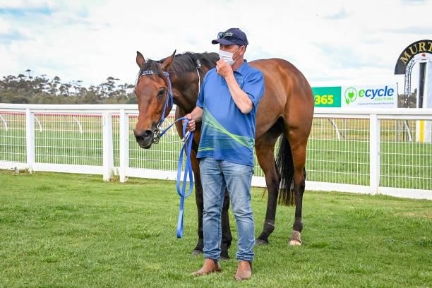 Peter Chow with Hostar after winning the Ecycle Solutions Murtoa Cup at Murtoa Racecourse on October 02, 2021 in Murtoa, Australia.