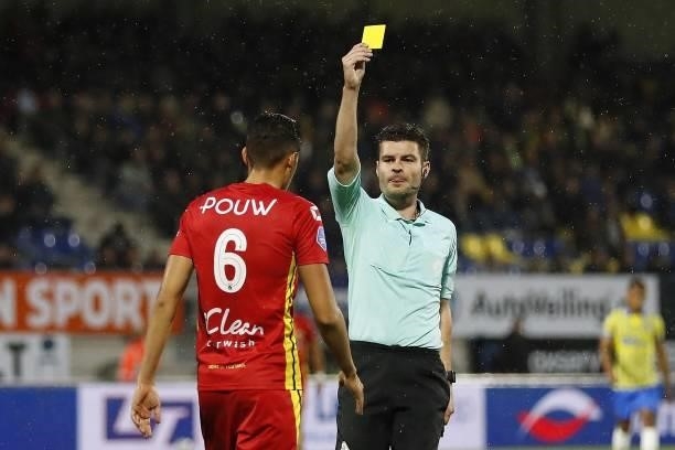 Jay Idzes of Go Ahead Eagles receives a yellow card from referee Erwin Blank during the Dutch Eredivisie match between RKC Waalwijk and Go Ahead...