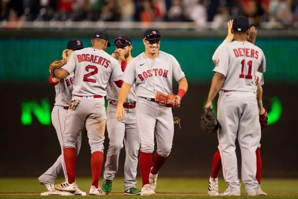 Members of the Boston Red Sox celebrate their victory against the Washington Nationals on October 2, 2021 at Nationals Park in Washington, DC.