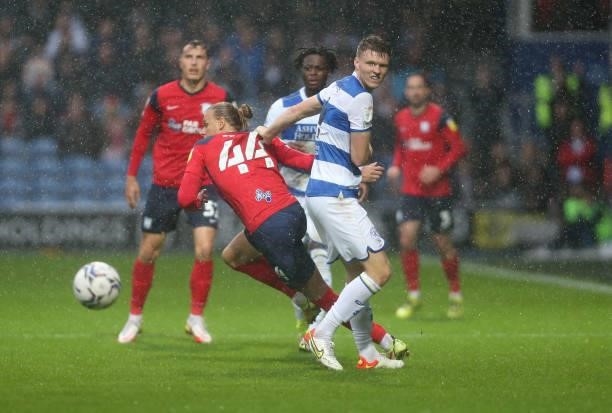 Preston North End's Brad Potts and Queens Park Rangers' Rob Dickie during the Sky Bet Championship match between Queens Park Rangers and Preston...