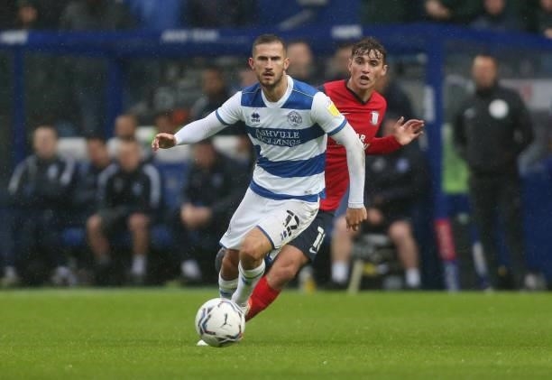 Queens Park Rangers' Dominic Ball and Preston North End's Ryan Ledson during the Sky Bet Championship match between Queens Park Rangers and Preston...
