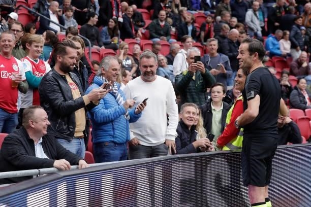 Referee Bas Nijhuis and supporters of Ajax during the Dutch Eredivisie match between Ajax v FC Utrecht at the Johan Cruijff Arena on October 3, 2021...