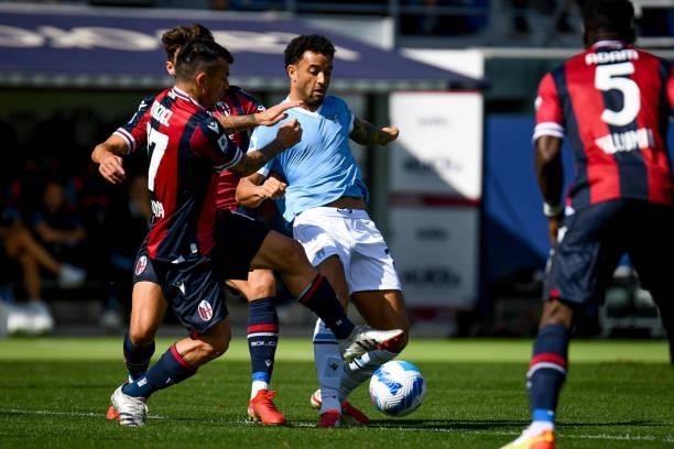 Felipe Anderson 1in action against Gary Medel and Aaron Hickey during the Italian football Serie A match Bologna FC vs SS Lazio on October 03, 2021...