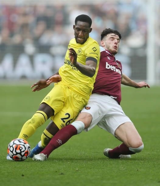 West Ham United's Declan Rice challenges Brentford's Shandon Baptiste which caused Baptiste to be forced off due to injury during the Premier League...