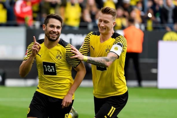 Raphael Guerreiro of Borussia Dortmund celebrates after scoring his team's first goal during the Bundesliga match between Borussia Dortmund and FC...
