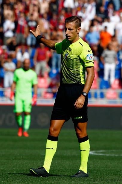 Referee Davide Massa gestures during the Serie A match between Bologna FC v SS Lazio at Stadio Renato Dall'Ara on October 3, 2021 in Bologna, Italy.