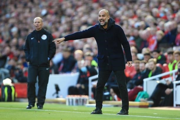 Manchester City manager Pep Guardiola gestures during the Premier League match between Liverpool and Manchester City at Anfield on October 3, 2021 in...