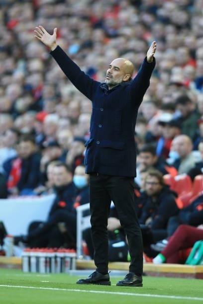 Manchester City manager Pep Guardiola looks dejected during the Premier League match between Liverpool and Manchester City at Anfield on October 3,...