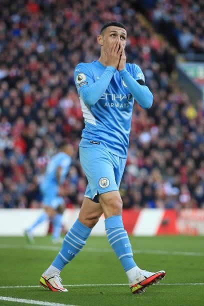 Phil Foden of Manchester City looks dejected during the Premier League match between Liverpool and Manchester City at Anfield on October 3, 2021 in...