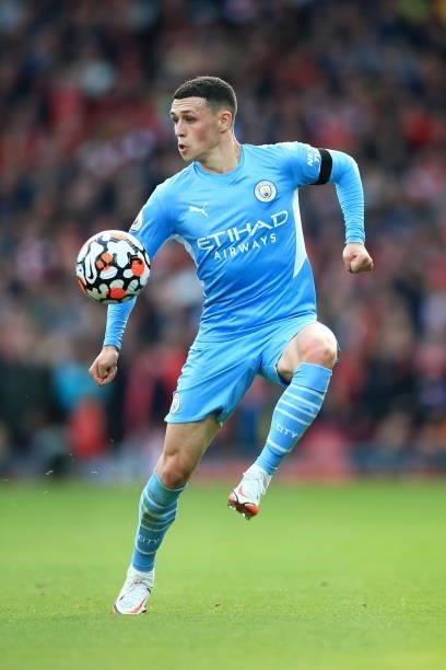 Phil Foden of Manchester City controls the ball during the Premier League match between Liverpool and Manchester City at Anfield on October 3, 2021...