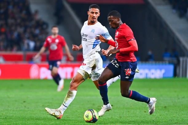William SALIBA of Marseille and Timothy WEAH of Lille during the Ligue 1 Uber Eats match between Lille and Marseille at Stade Pierre Mauroy on...