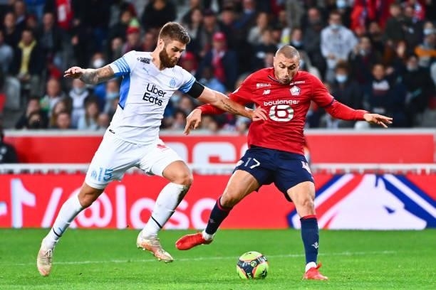 Duje CALETA CAR of Marseille and Burak YILMAZ of Lille during the Ligue 1 Uber Eats match between Lille and Marseille at Stade Pierre Mauroy on...