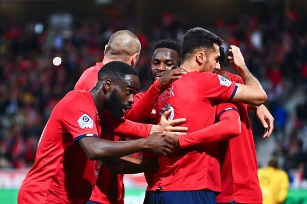 Jonathan DAVID of Lille celebrates a goal with Zeki CELIK of Lille, Jonathan IKONE of Lille and Jonathan BAMBA of Lille during the Ligue 1 Uber Eats...