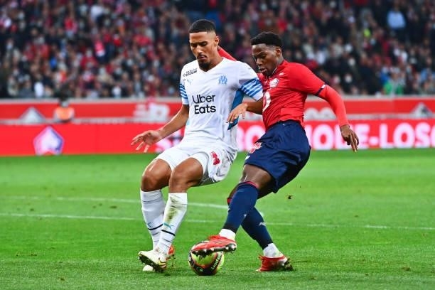 William SALIBA of Marseille and Jonathan DAVID of Lille during the Ligue 1 Uber Eats match between Lille and Marseille at Stade Pierre Mauroy on...