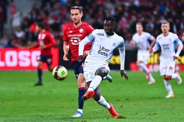 Yusuf YAZICI of Lille and Pape GUEYE of Marseille during the Ligue 1 Uber Eats match between Lille and Marseille at Stade Pierre Mauroy on October 3,...