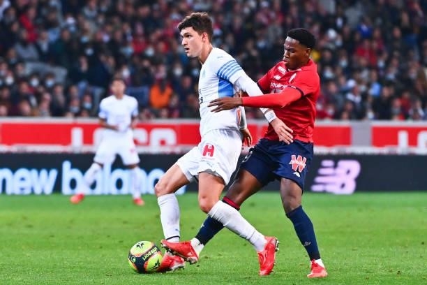 Leonardo BALERDI of Marseille and Jonathan DAVID of Lille during the Ligue 1 Uber Eats match between Lille and Marseille at Stade Pierre Mauroy on...