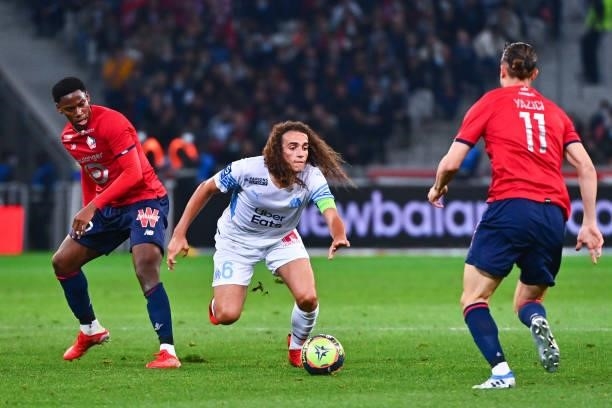 Jonathan DAVID of Lille, Matteo GUENDOUZI of Marseille and Yusuf YAZICI of Lille during the Ligue 1 Uber Eats match between Lille and Marseille at...