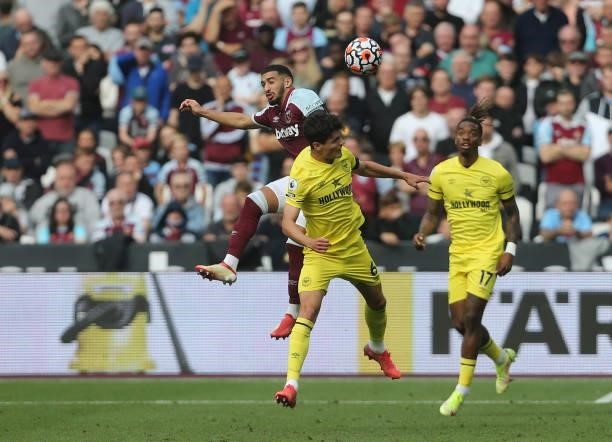 West Ham United's Said Benrahma and Brentford's Christian Norgaard during the Premier League match between West Ham United and Brentford at London...