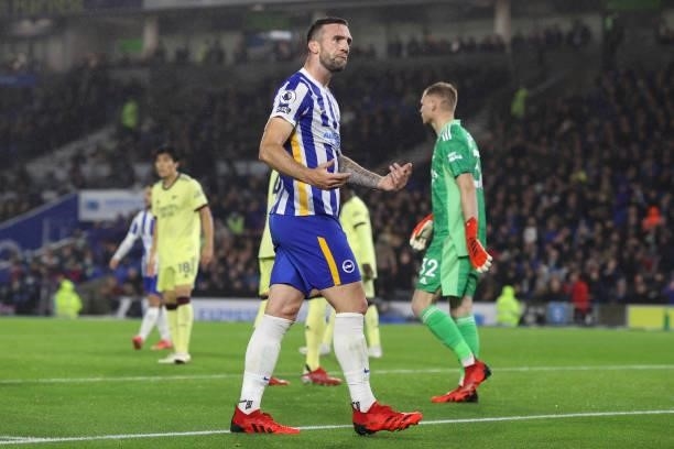 Shane Duffy of Brighton encourages support from the crowd during the Premier League match between Brighton & Hove Albion and Arsenal at American...