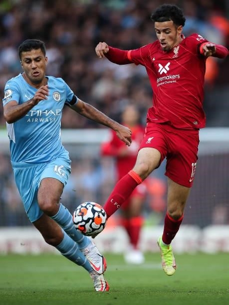 Rodri of Manchester City and Curtis Jones of Liverpool during the Premier League match between Liverpool and Manchester City at Anfield on October 3,...